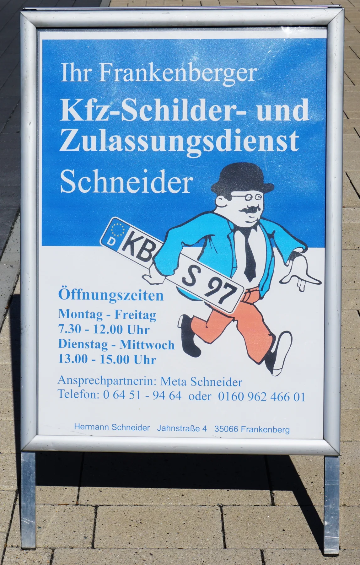 Werbeschild des Kfz-Schilder- und Zulassungsdienstes Schneider